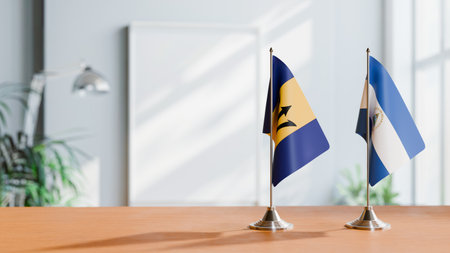 FLAGS OF  BARBADOS AND NICARAGUA  ON TABLEの写真素材