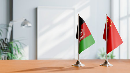 FLAGS OF AFGHANISTAN AND CHINA ON TABLEの写真素材
