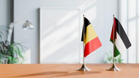 FLAGS OF  BELGIUM AND KAZAKHSTAN  ON TABLEの写真素材