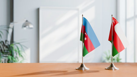 FLAGS OF  AZERBAIJAN AND OMAN  ON TABLEの写真素材