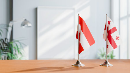 FLAGS OF  AUSTRIA AND GEORGIA  ON TABLEの写真素材