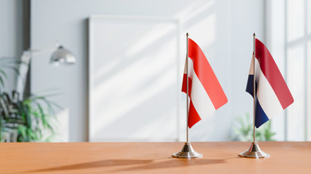 FLAGS OF  AUSTRIA AND NETHERLANDS  ON TABLEの写真素材