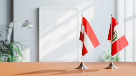 FLAGS OF  AUSTRIA AND PERU  ON TABLEの写真素材