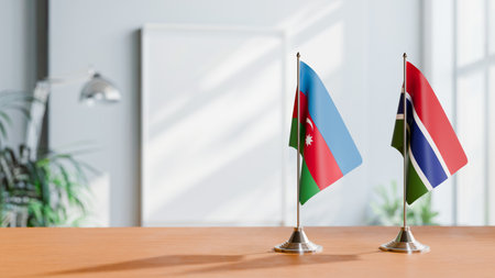 FLAGS OF  AZERBAIJAN AND GAMBIA  ON TABLEの写真素材