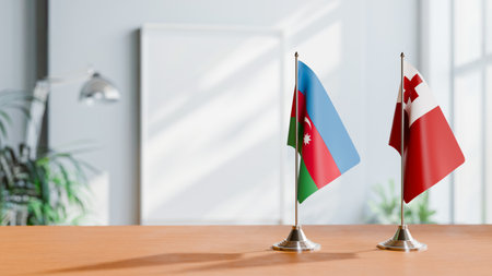 FLAGS OF  AZERBAIJAN AND TONGA  ON TABLEの写真素材