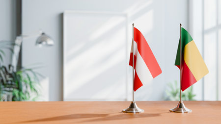 FLAGS OF  AUSTRIA AND BENIN  ON TABLEの写真素材