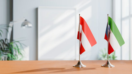 FLAGS OF  AUSTRIA AND EQUATORIAL GUINEA  ON TABLEの写真素材