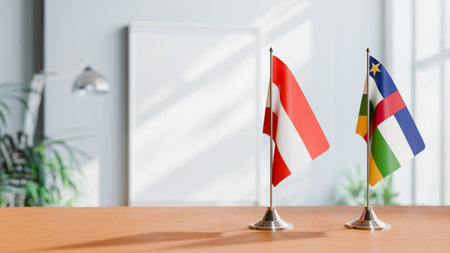 FLAGS OF  AUSTRIA AND CENTRAL AFRICAN REPUBLIC  ON TABLEの写真素材