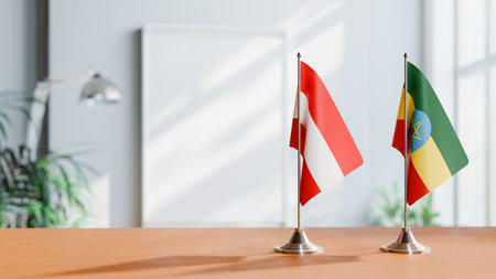 FLAGS OF  AUSTRIA AND ETHIOPIA  ON TABLEの写真素材