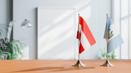 FLAGS OF  AUSTRIA AND GUATEMALA  ON TABLEの写真素材
