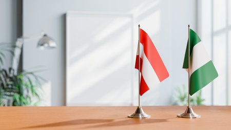 FLAGS OF  AUSTRIA AND NIGERIA  ON TABLEの写真素材