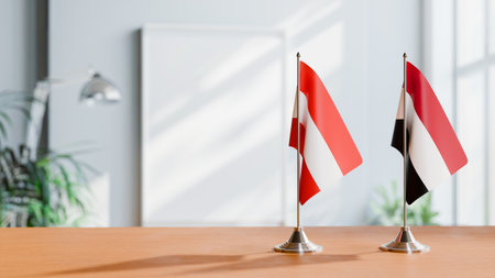 FLAGS OF  AUSTRIA AND YEMEN  ON TABLEの写真素材