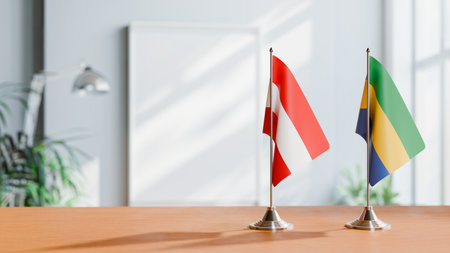 FLAGS OF  AUSTRIA AND GABON  ON TABLEの写真素材