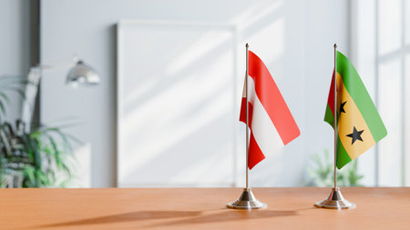 FLAGS OF  AUSTRIA AND SAO TOME  ON TABLEの写真素材