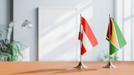 FLAGS OF  AUSTRIA AND GUYANA  ON TABLEの写真素材