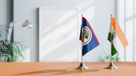 FLAGS OF BELIZE AND INDIA ON TABLEの写真素材