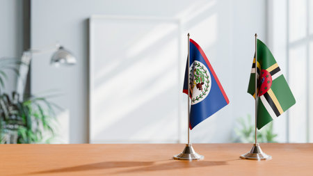 FLAGS OF BELIZE AND DOMINICA ON TABLEの写真素材