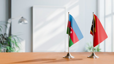 FLAGS OF  AZERBAIJAN AND EAST TIMOR  ON TABLEの写真素材