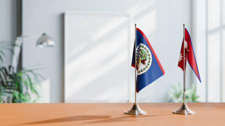 FLAGS OF BELIZE AND NEPAL ON TABLEの写真素材