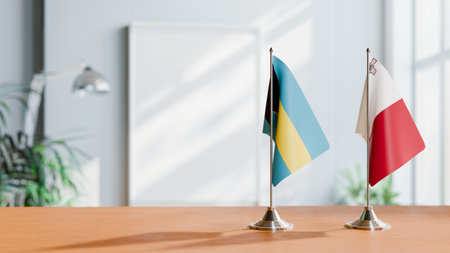 FLAGS OF  BAHAMAS AND MALTA  ON TABLEの写真素材