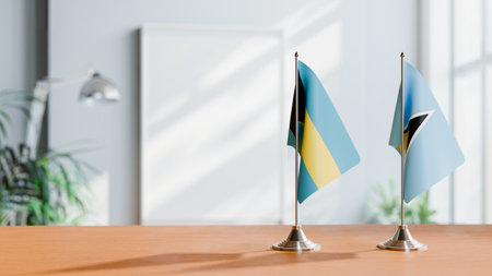 FLAGS OF  BAHAMAS AND SAINT LUCIA  ON TABLEの写真素材