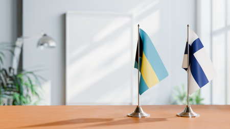 FLAGS OF  BAHAMAS AND FINLAND  ON TABLEの写真素材