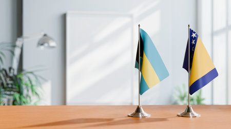 FLAGS OF  BAHAMAS AND BOSNIA  ON TABLEの写真素材