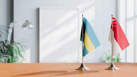 FLAGS OF  BAHAMAS AND SINGAPORE  ON TABLEの写真素材