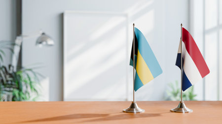 FLAGS OF  BAHAMAS AND NETHERLANDS  ON TABLEの写真素材