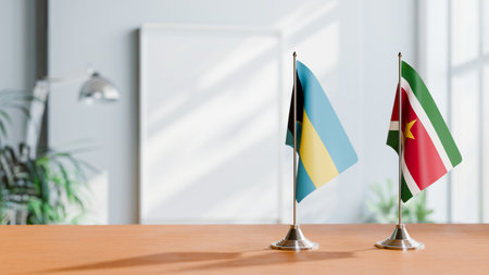 FLAGS OF  BAHAMAS AND SURINAME  ON TABLEの写真素材