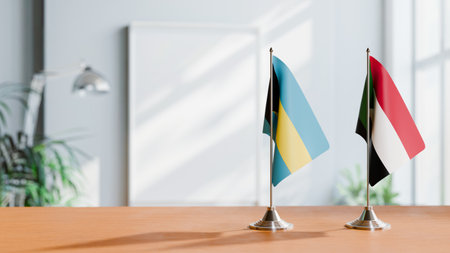 FLAGS OF  BAHAMAS AND SUDAN  ON TABLEの写真素材