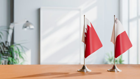 FLAGS OF  BAHRAIN AND MALTA  ON TABLE