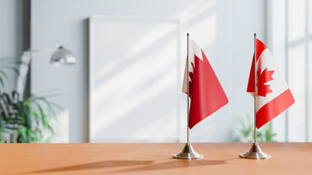 FLAGS OF  BAHRAIN AND CANADA  ON TABLEの写真素材