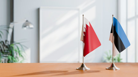 FLAGS OF  BAHRAIN AND ESTONIA  ON TABLEの写真素材