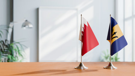 FLAGS OF  BAHRAIN AND BARBADOS  ON TABLEの写真素材