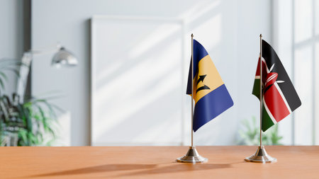 FLAGS OF  BARBADOS AND KENYA  ON TABLEの写真素材