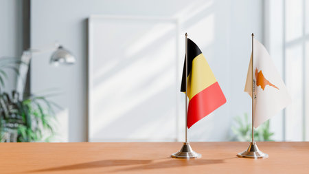 FLAGS OF  BELGIUM AND CYPRUS  ON TABLE