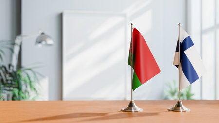 FLAGS OF  BELARUS AND FINLAND  ON TABLEの写真素材