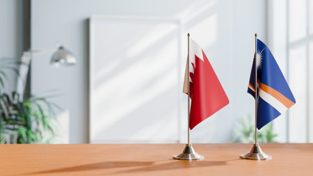 FLAGS OF  BAHRAIN AND MARSHALL ISLANDS  ON TABLEの写真素材