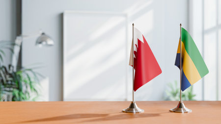 FLAGS OF  BAHRAIN AND GABON  ON TABLEの写真素材