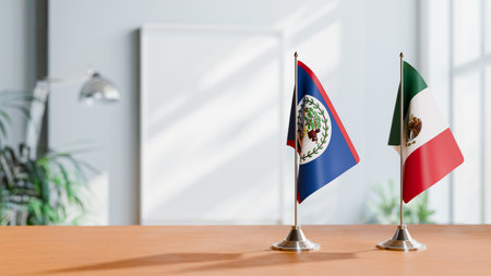 FLAGS OF BELIZE AND MEXICO ON TABLEの写真素材