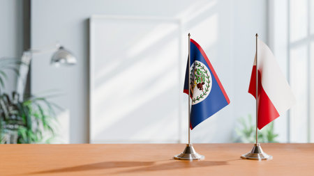 FLAGS OF BELIZE AND POLAND ON TABLEの写真素材