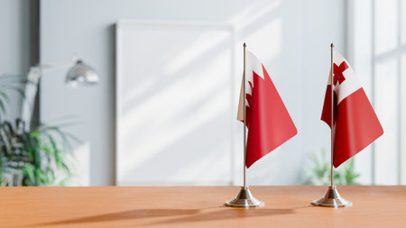 FLAGS OF  BAHRAIN AND TONGA  ON TABLEの写真素材