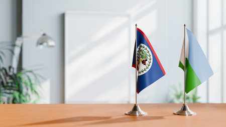 FLAGS OF BELIZE AND DJIBOUTI ON TABLEの写真素材