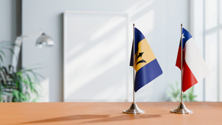 FLAGS OF  BARBADOS AND CHILE  ON TABLE