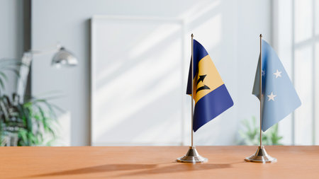 FLAGS OF  BARBADOS AND MICRONESIA  ON TABLEの写真素材