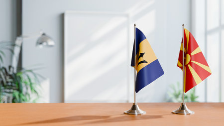 FLAGS OF  BARBADOS AND MACEDONIA  ON TABLEの写真素材