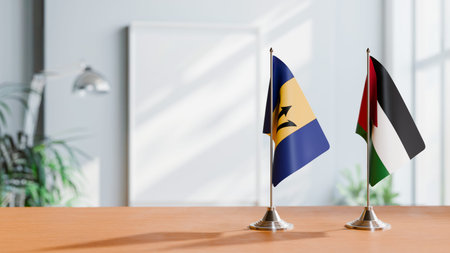 FLAGS OF BARBADOS AND KAZAKHSTAN ON TABLE