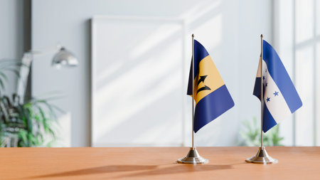 FLAGS OF  BARBADOS AND HONDURAS  ON TABLE