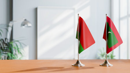 FLAGS OF  BELARUS AND MALDIVES  ON TABLEの写真素材